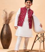 maroon nehru jacket,and white  kurta and pyjama set