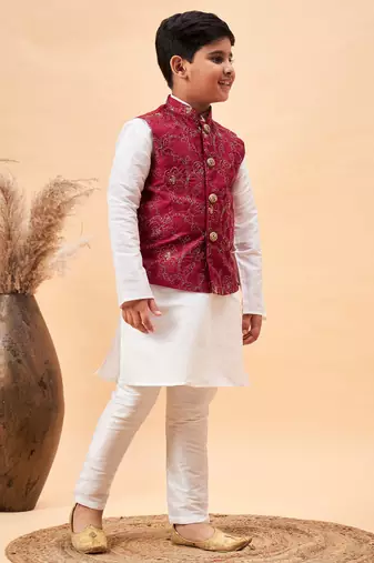 maroon nehru jacket,and white  kurta and pyjama set