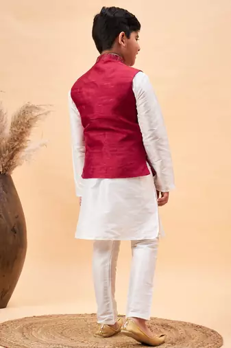 maroon nehru jacket,and white  kurta and pyjama set