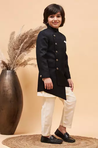 cream and black sherwani set