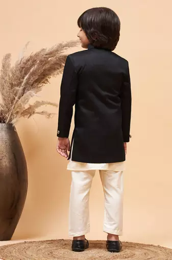 cream and black sherwani set
