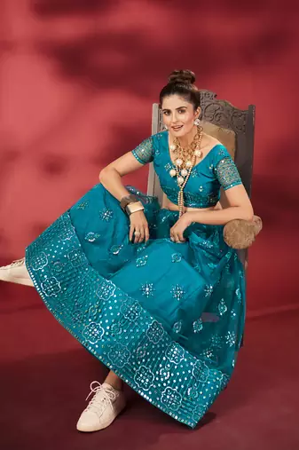 Rama Blue Sequins Embroidered Net Lehenga Choli