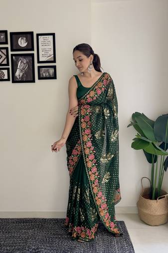 Women georgette thread,sequance embroidery work green color saree