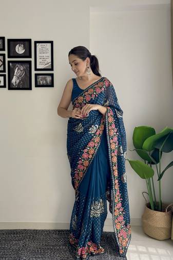Women georgette thread,sequance embroidery work teal color saree