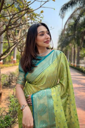 Women tissue silk  Woven designer pista color saree