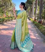 Women tissue silk weaving jari designer green color saree