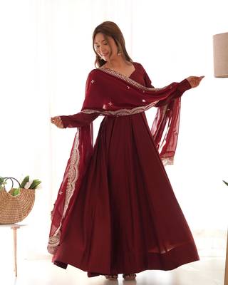 Maroon Colour Party wear Pure Roman Silk Fully  Gown Set 1