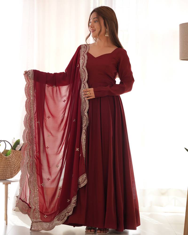Maroon Colour Party Wear Pure Roman Silk Fully Stitched Gown Set