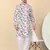 Men cotton peach and white geometric printed kurta with elastic waistband pyjama