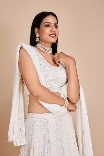White Faux Georgette Embroidered Sequins Lehenga With Choli And Dupatta Party Wear