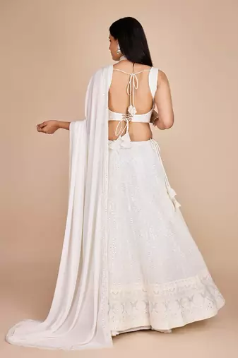 White Faux Georgette Embroidered Sequins Lehenga With Choli And Dupatta Party Wear