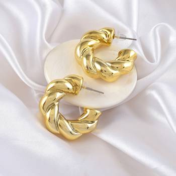 Acrylic goldplated twisted hoop earrings women 1