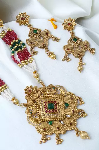 Gold plated antique peacock motif stone studded temple jewellery set