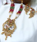 Gold plated antique floral motif stone studded temple jewellery set