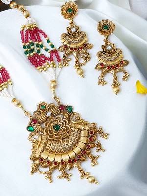 Gold plated antique floral motif emerald studded temple jewellery set 1