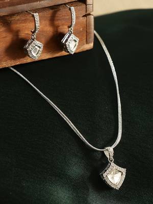 Silver-plated kundan neckpiece with ad stone and matching studs 1