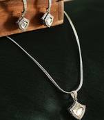 Silver-plated kundan neckpiece with ad stone and matching studs