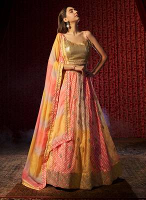  Yellow & Orange Colored Organza Embroidered And Printed Indian Lehenga Choli Designs 1