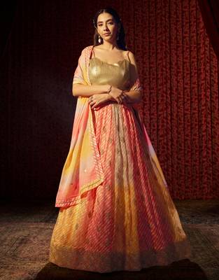  Yellow & Orange Colored Organza Embroidered And Printed Indian Lehenga Choli Designs 6