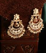 Gold plated kundan studded peacock earrings