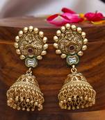 Gold plated traditional kundan studded floral design jhumkas