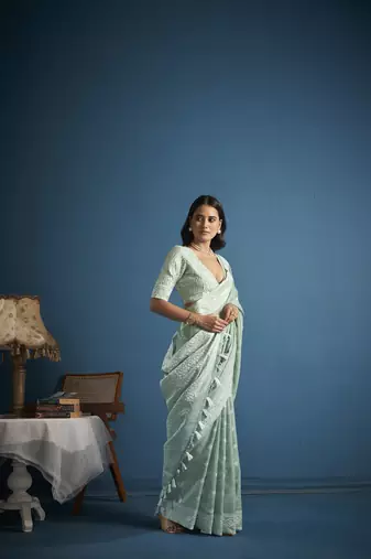 Elora soft linen silk with chikhankhari weaved border designer saree for women (sea green)