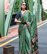 Green ajrakh printed satin silk blend saree with blouse