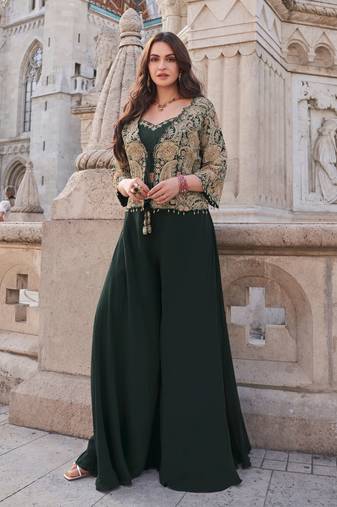 Green embroidered silk free size stitched blouse palazzo.