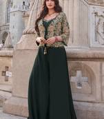 Green embroidered silk free size stitched blouse palazzo.