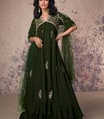 Green embroidered chinnon silk free size stitched gown.