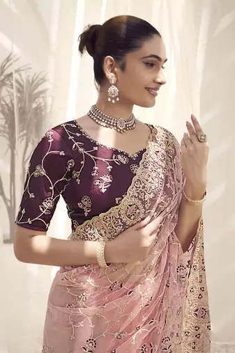 Gajri color  codes and sequins net wedding wear saree with blouse fabric