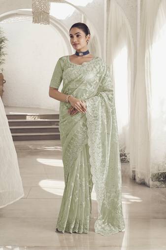 Pista color  codes and sequins net wedding wear saree with blouse fabric