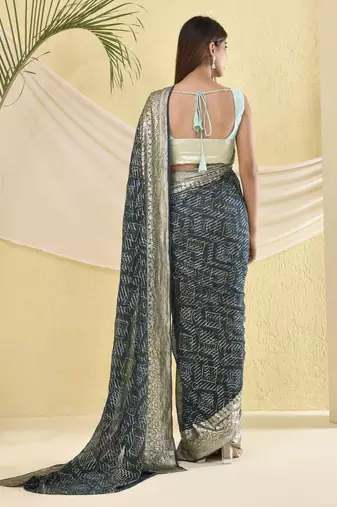 Blue heavy bordered saree with unstitched blouse fabric