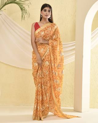Yellow bandhani and zari work saree with unstitched blouse fabric 3