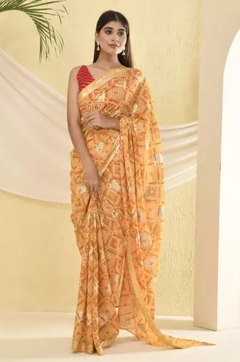 Yellow bandhani and zari work saree with unstitched blouse fabric