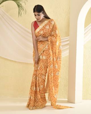Yellow bandhani and zari work saree with unstitched blouse fabric 5
