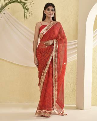 Red bandhani worked saree with unstitched blouse fabric 5