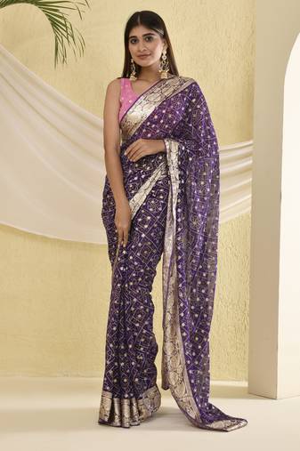 Purple bandhani and zari work saree with unstitched pink blouse fabric