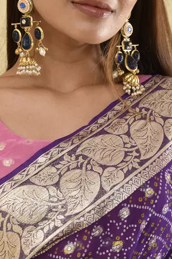 Purple bandhani and zari work saree with unstitched pink blouse fabric