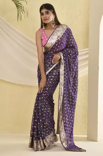 Purple bandhani and zari work saree with unstitched pink blouse fabric