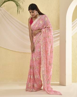 Flamingo pink bandhani saree with magenta unstitched blouse fabric 4