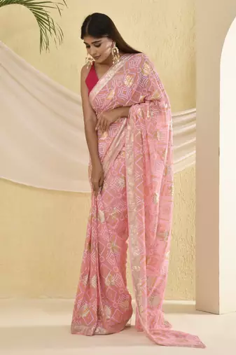Flamingo pink bandhani saree with magenta unstitched blouse fabric