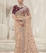 Peach color  codes and sequins net wedding wear saree with blouse fabric