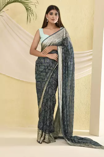 Blue heavy bordered saree with unstitched blouse fabric