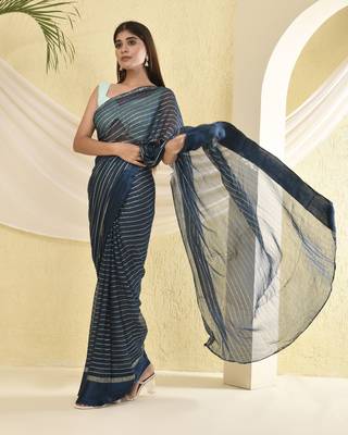 Blue zari striped saree with heavy bordered and unstitched blouse 1