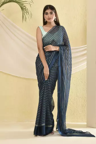 Blue zari striped saree with heavy bordered and unstitched blouse
