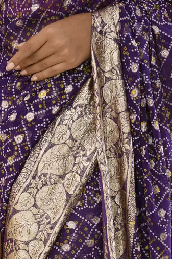 Purple bandhani and zari work saree with unstitched pink blouse fabric
