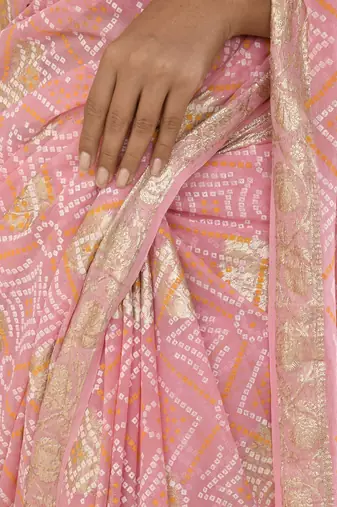 Flamingo pink bandhani saree with magenta unstitched blouse fabric