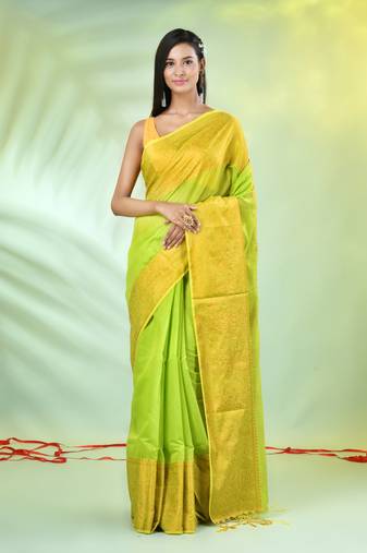 Light green cotton saree with zari borders