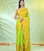 Light green cotton saree with zari borders